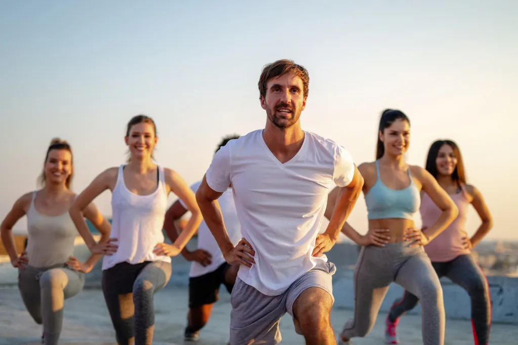 group training left food forward and both hands on their hips